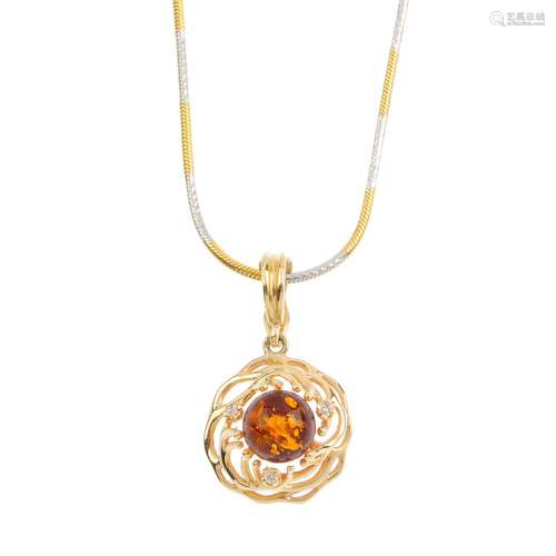 A set of amber jewellery. To include a circular reconstituted amber cabochon pendant, with