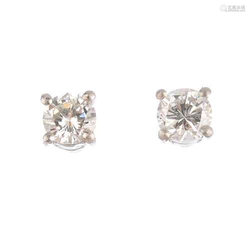 A pair of platinum brilliant-cut diamond stud earrings. Estimated total diamond weight 0.35ct, H-I