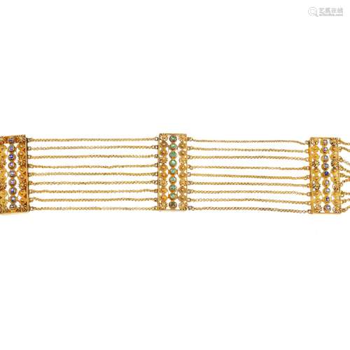 A gem-set bracelet. Comprising three gem-set cannetille panels, with nine rows of trace-link chain