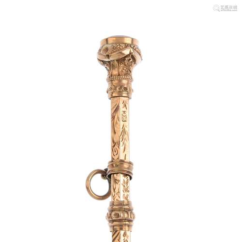 An early 20th century 9ct gold retractable pencil. With engraved scrolling foliate motif and