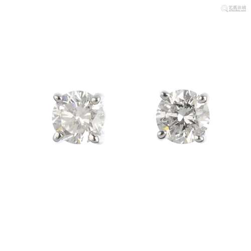 A pair of 18ct gold brilliant-cut diamond stud earrings. Total diamond weight 0.51ct, estimated J-