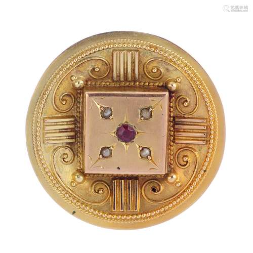 Three brooches. To include a late 19th century 9ct gold ruby and split pearl circular brooch, a