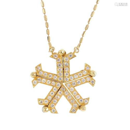 A cubic zirconia snowflake pendant. The pave-set cubic zirconia snowflake, with a series of five