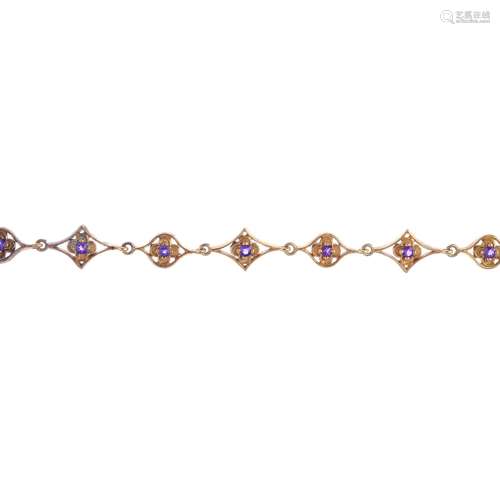 An amethyst bracelet. Designed as a series of circular-shape amethysts, each within an alternating