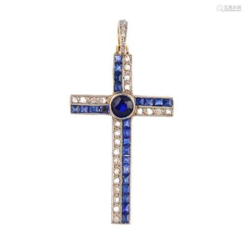 A diamond and gem-set cross pendant. Designed as a calibre-cut sapphire and rose-cut diamond