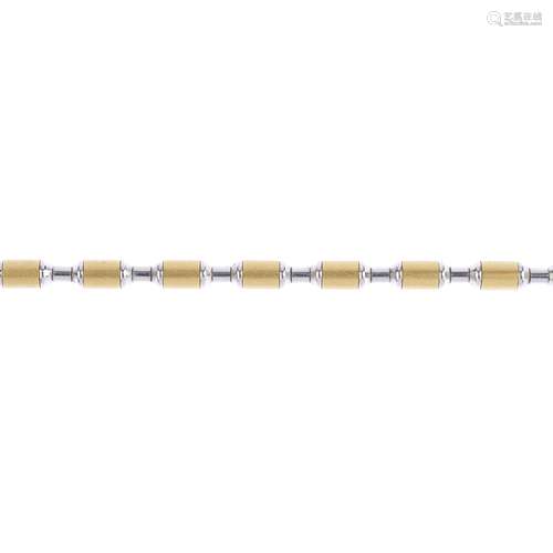 A necklace and matching bracelet. The necklace, designed as a series of alternating bi-colour