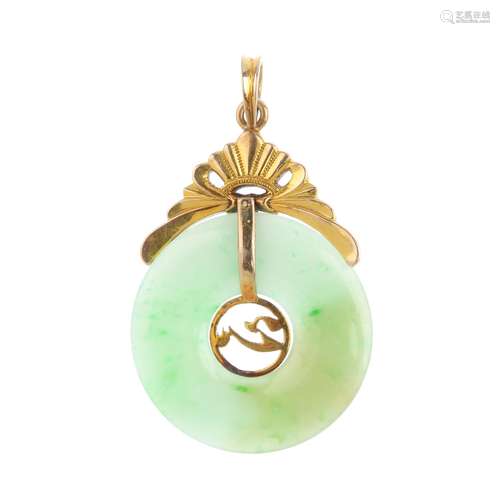 A jade pendant. Designed as a jade bi, with a textured ribbon surmount, suspending a chevron motif