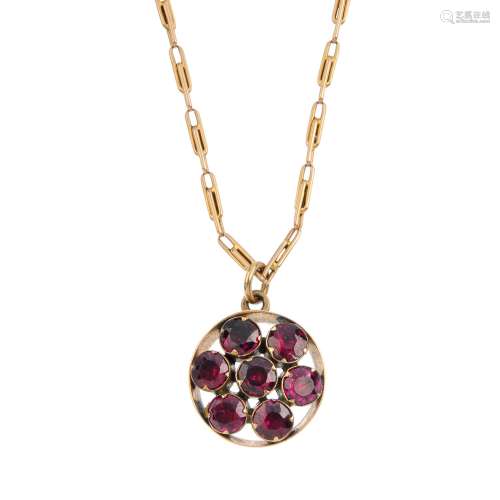 A garnet pendant. the circular-shape garnet cluster, suspended from an early 20th century 15ct