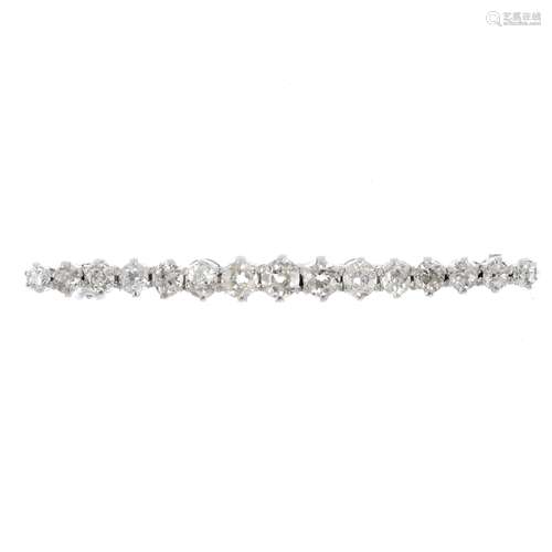 A diamond brooch. Designed as a graduated old-cut diamond line. Estimated total diamond weight 1.