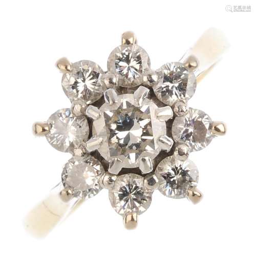 (52406) A diamond cluster ring. Designed as a brilliant-cut diamond, with similarly-cut diamond