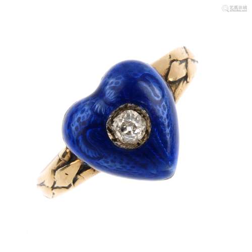 A diamond and enamel dress ring. The old-cut diamond, inset to the blue enamel heart, with