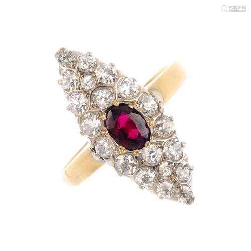 A ruby and diamond dress ring. The oval-shape ruby and single-cut diamond marquise-shape cluster,