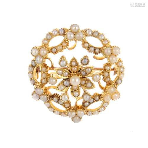 An early 20th century split pearl brooch. Of floral design, the split pearl cluster, with