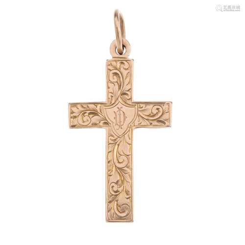 An early 20th century 9ct gold cross pendant. The engraved foliate motif cross, with hook