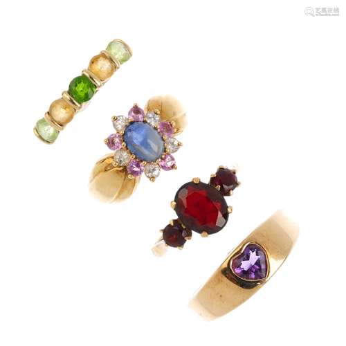 Four gem-set rings. To include a 9ct gold heart-shape amethyst ring, a 9ct gold oval sapphire