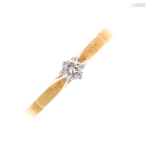 An 18ct gold diamond single-stone ring. The brilliant-cut diamond to the tapered shoulders.