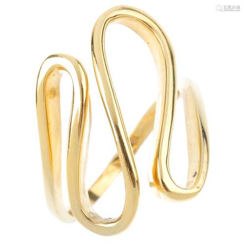 A dress ring. The front designed as a series of scrolling loops, with plain band. Ring size O.