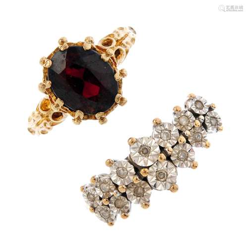 Four gem-set rings. To include a 9ct gold garnet dress ring, an illusion-set diamond dress ring,