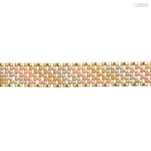 A 9ct gold necklace. Of tri-colour design, comprising seven rows of polished and textured brick