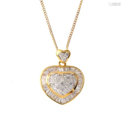 An 18ct gold diamond heart pendant. The brilliant and baguette-cut diamond heart, suspended from the