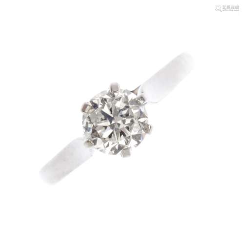 A diamond single-stone ring. The brilliant-cut diamond, with raised mount and tapered band.