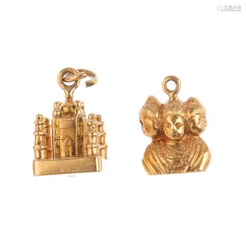 Two charms. To include a Taj Mahal charm, together with an Asura charm. Lengths 1.4 and 2cms. Weight