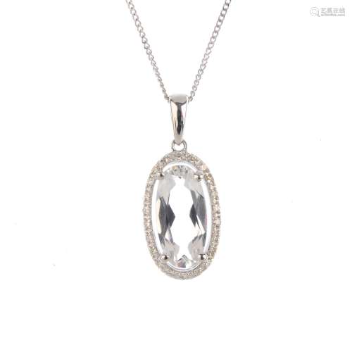 A pair of topaz and diamond earrings, and pendant. Each designed as an oval-shape topaz, with a