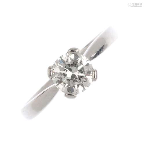 A platinum diamond single-stone ring. The brilliant-cut diamond, with tapered shoulders. Diamond