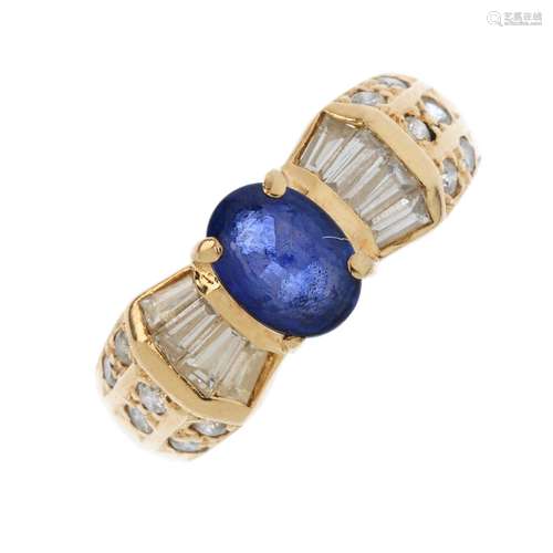 A 14ct gold sapphire and diamond dress ring. The oval-shape sapphire, with vari-cut diamond