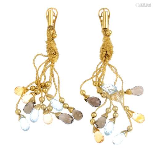 A pair of gem-set earrings. Each designed as a series of gem briolettes, to include blue topaz,