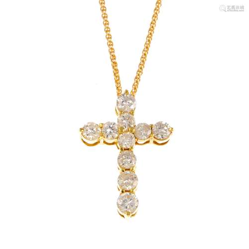 A diamond cross pendant. The brilliant-cut diamond cross pendant, with fancy-link chain. Estimated