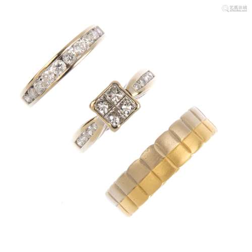 (52412) Three 18ct gold rings. To include a diamond band ring, a diamond dress ring, together with