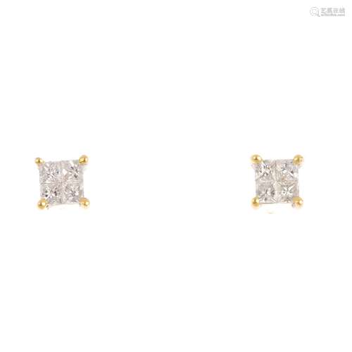 A pair of 18ct gold diamond stud earrings. Each designed as a cluster of four square-cut diamonds.