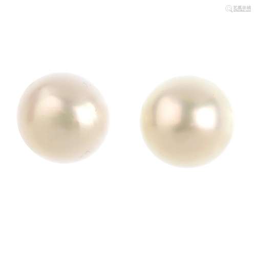 A pair of cultured pearl stud earrings. Cultured pearls measuring 14.6 and 14.5mms. Overall