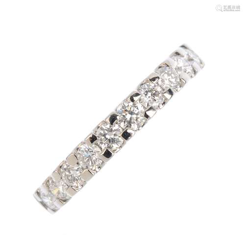 A platinum diamond half eternity ring. Designed as a brilliant-cut diamond line. Total diamond