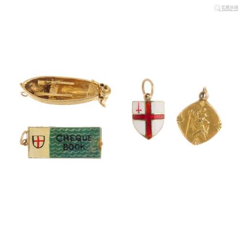 Four 9ct gold charms. To include a boat with paddles charm, a cheque book charm, together with two
