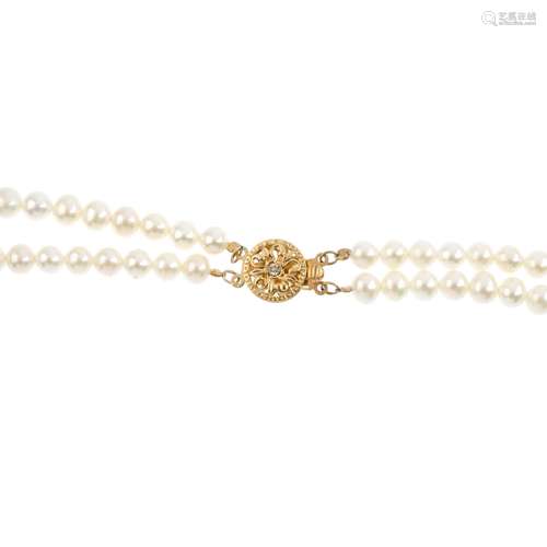 Three cultured pearl two-row necklaces. One with a 9ct gold single-cut diamond accent openwork