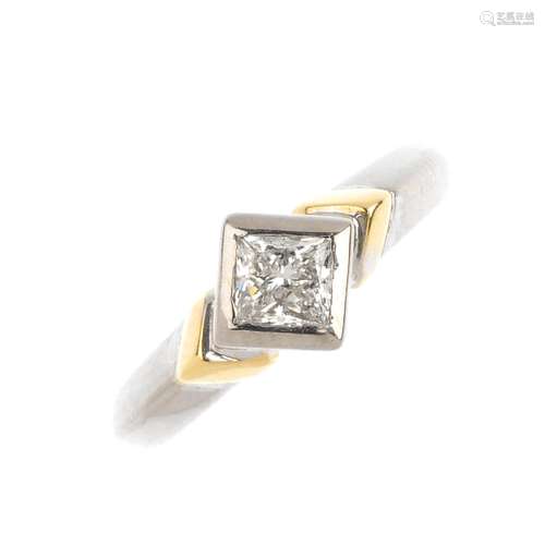 An 18ct gold diamond single-stone ring. The kite-shape diamond, with stepped sides and tapered band.