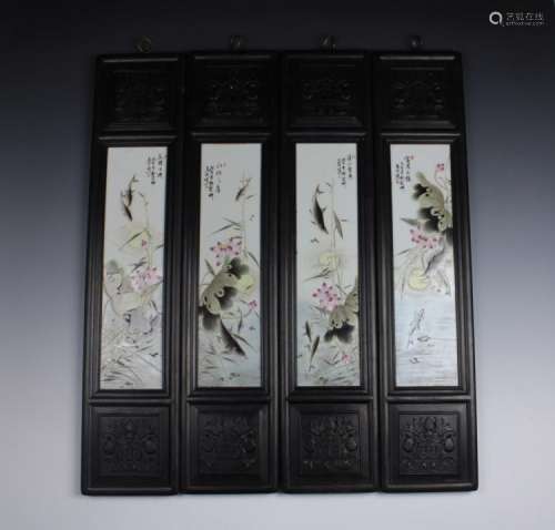 FOUR PANELS OF CHINESE PORCELAIN FAMILLE ROSE FISH AND LOTUS PLAQUES