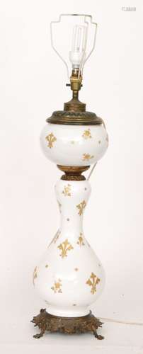 A late Victorian baluster white opaque and gilt overpainted oil lamp, height 60cm