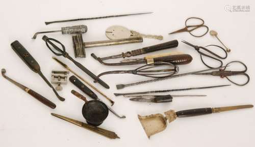 A collection of steel shafted opium pipe tools to include a Chinese silver handled example, steel cutting scissors and various accessories (qty)