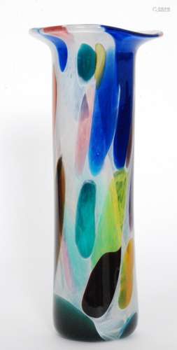 A large studio glass vase by Will Shakespeare of sleeve form with a flared rim decorated with multicoloured spotting within the mottled opal ground, original label and engraved signature, height 32cm.