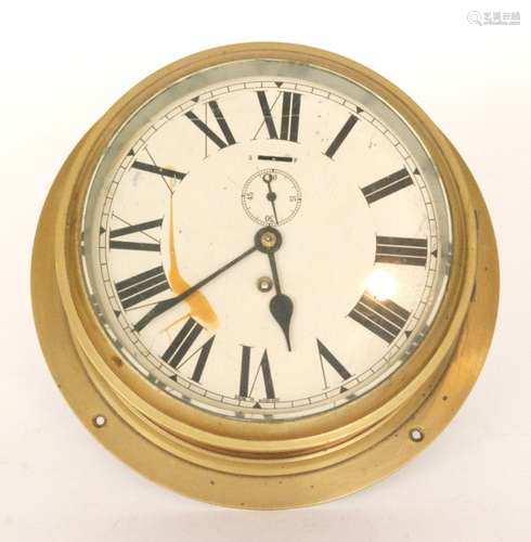 A 20th Century brass bulkhead wall clock, width 28cm