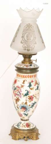 A Zolnay style overpainted cream patterned oil lamp in the traditional style with matching reservoir and etched shade, height 66cm