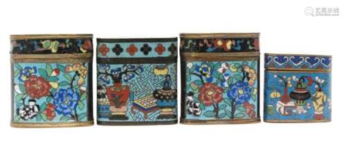 A pair of Chinese cloisonne cylindrical opium boxes and covers decorated with flowers on a black and turquoise ground and two similar opium boxes both decorated with vases, koros and tableware (4)