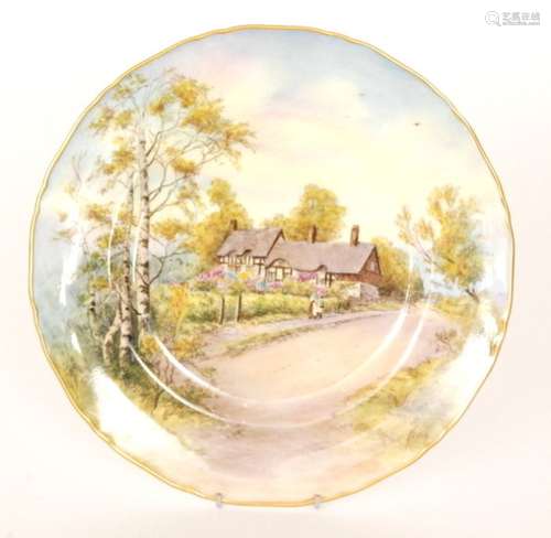 A Royal Worcester cabinet plate decorated with a scene of Anne Hathaway's Cottage, indistinctly signed, printed mark with date for 1959, diameter 27cm