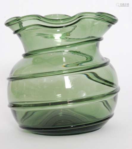 An early 20th Century Stuart & Sons glass vase of spherical form below a wave rim with applied trailing all in deep green, height 18cm.