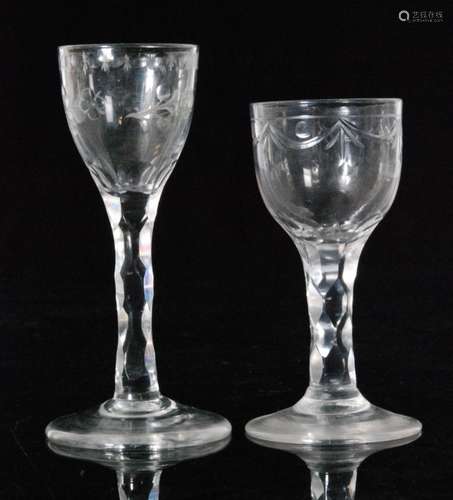 An 18th Century drinking glass circa 1785, ovoid bowl with engraved OXO border above repeat flower motives above a diamond facet cut stem and conical foot, height 14cm, together with a similar smaller example with a cut swag border, height 14cm. (2)