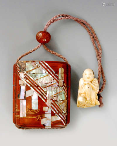 A 19th Century three case inro the red/brown ground inlaid in aogai with a bridge to one side and chidori in flight over a stream to reverse, length 7cm, amber bead ojime and an ivory netsuke modelled as a kneeling man worried at a black spot on his leg, height 4cm, signed Shokosai, S/D.  B/R 077/16