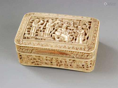 An early 19th Century rectangular ivory snuff box intricately carved with four figures in a garden setting to the hinged cover above further garden scene to the sides, terminating in gold thumb piece, length 6cm.   BR 063